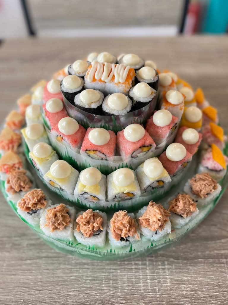 Tiered Classic Sushi cake made with assorted sushi rolls